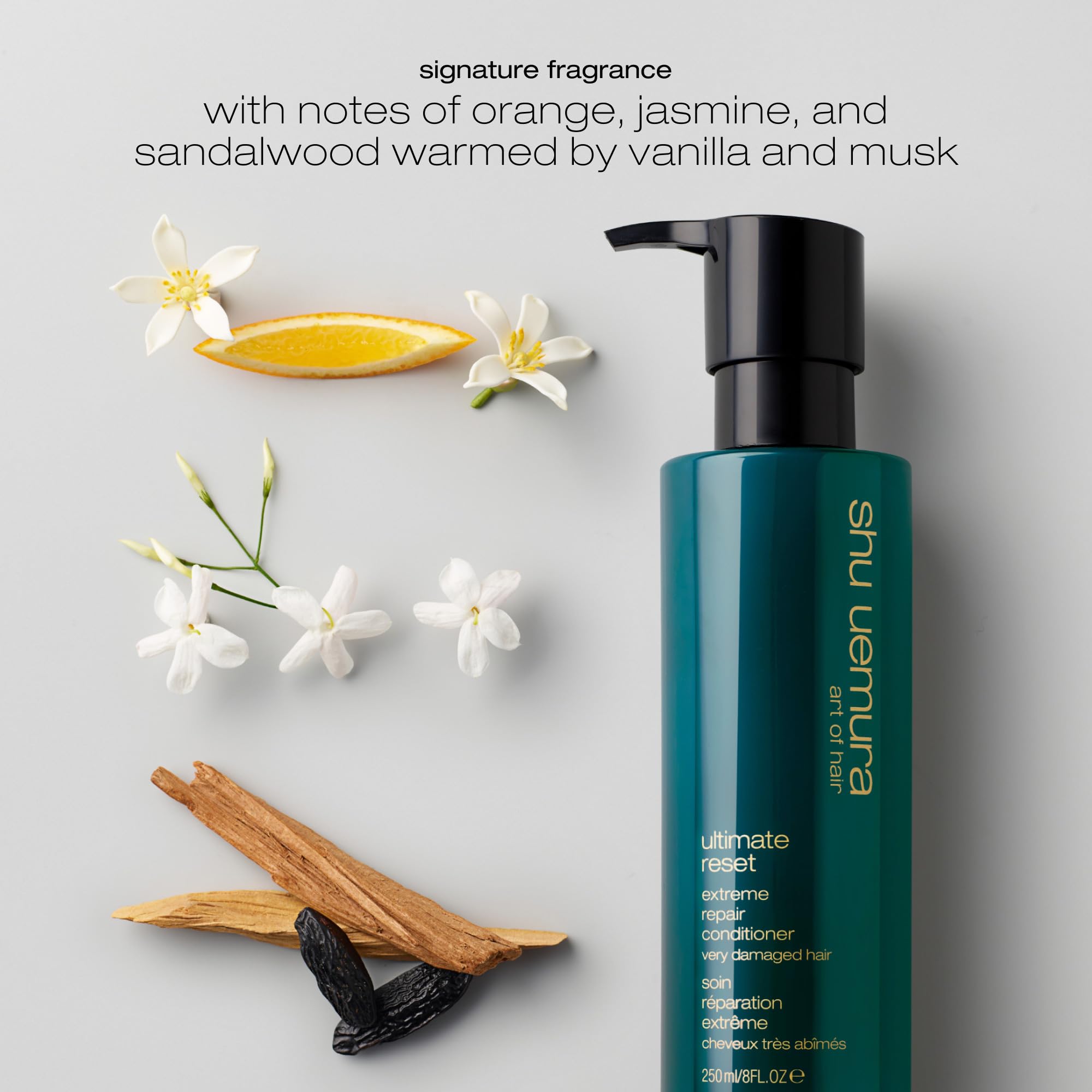 shu uemura bottle in hand showing 8 fl oz scale and travel-friendly benefit