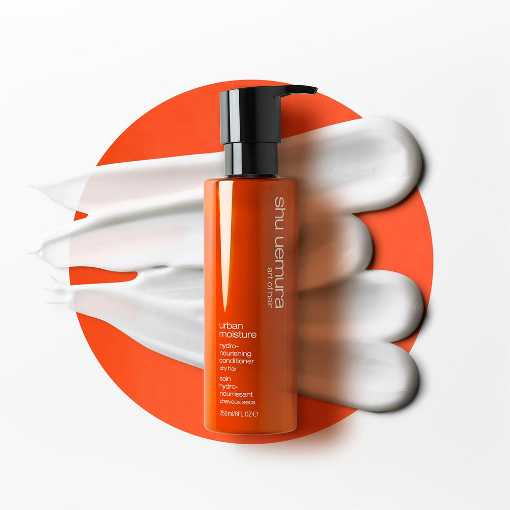 shu uemura art of hair conditioner applied to damp hair showing easier detangling benefit