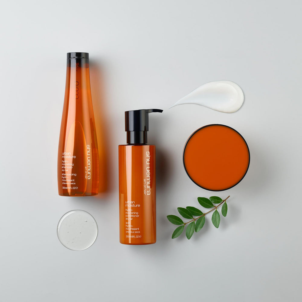 shu uemura art of hair product on bathroom shelf in lifestyle setting for daily routine appeal