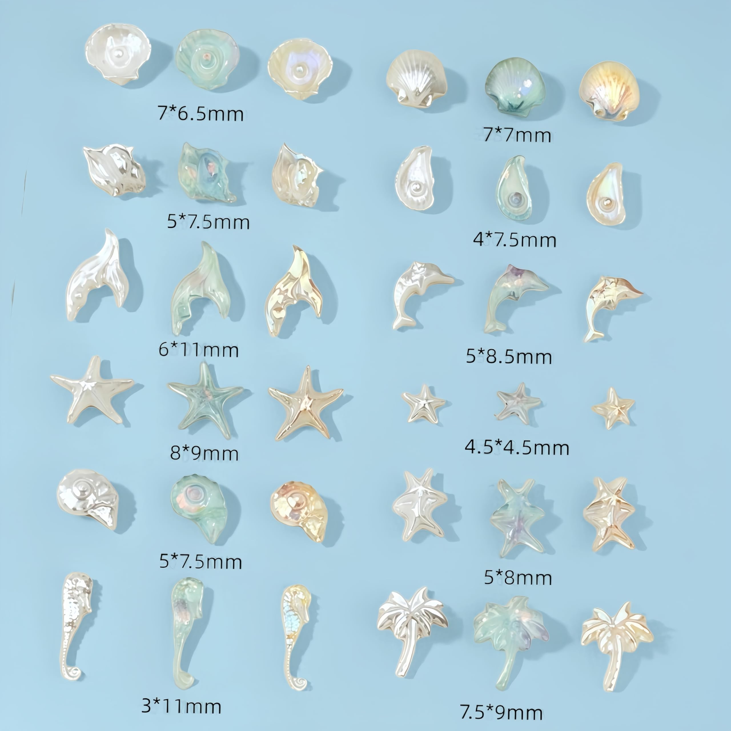 SHUXILIN charms applied on acrylic nail swatch showing beach style
