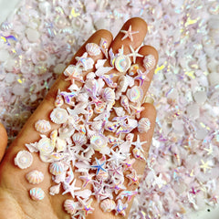 SHUXILIN front packaging showing mixed beach nail charms and kit benefit