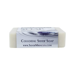 Silver Miracles soap beside towel in bathroom showing fresh citrus cleansing