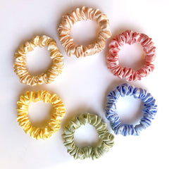 Silvr Bear front packaging showing six pastel scrunchies, neat presentation benefit