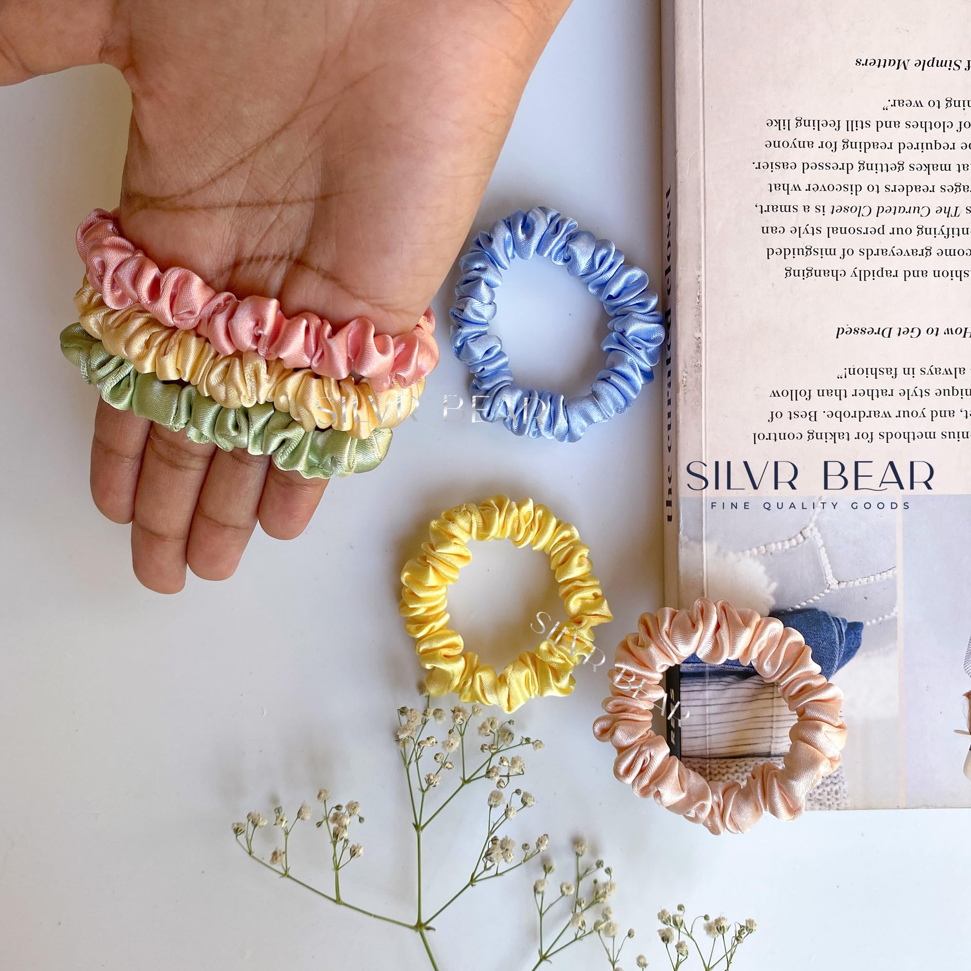 Silvr Bear holding thin ponytail, secure gentle grip without breakage benefit