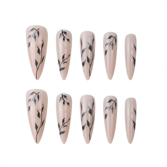 SINHOT close-up of black leaf design highlighting intricate art and refined style