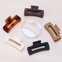 Sisiaipu six-color clips laid out in lifestyle scene showing styling options