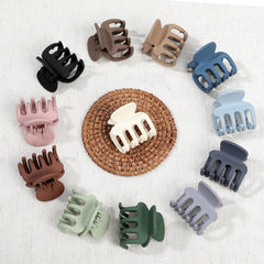 Sisiaipu clip holding a small bun in use showing practical everyday styling