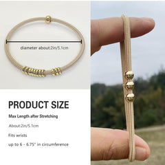 SISYOUP hair tie beside ruler displaying dimensions and stretch capacity