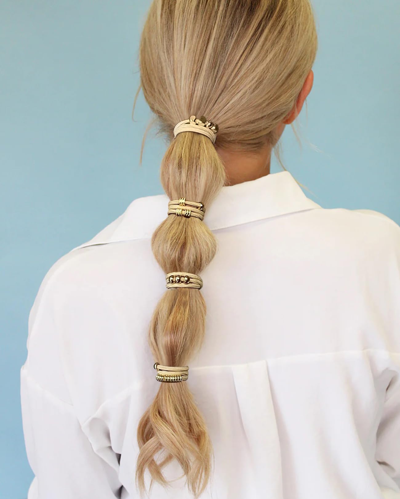 SISYOUP hair tie worn as bracelet outdoors showing stylish, versatile accessory