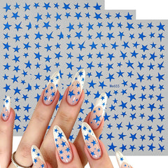 Siznkore stickers applied on nails demonstrating quick festive manicure