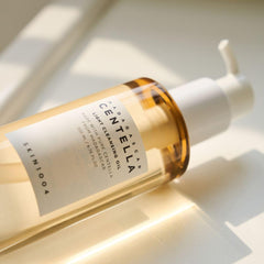 SKIN1004 cleansing oil watery texture on palm demonstrating lightweight, non-greasy feel
