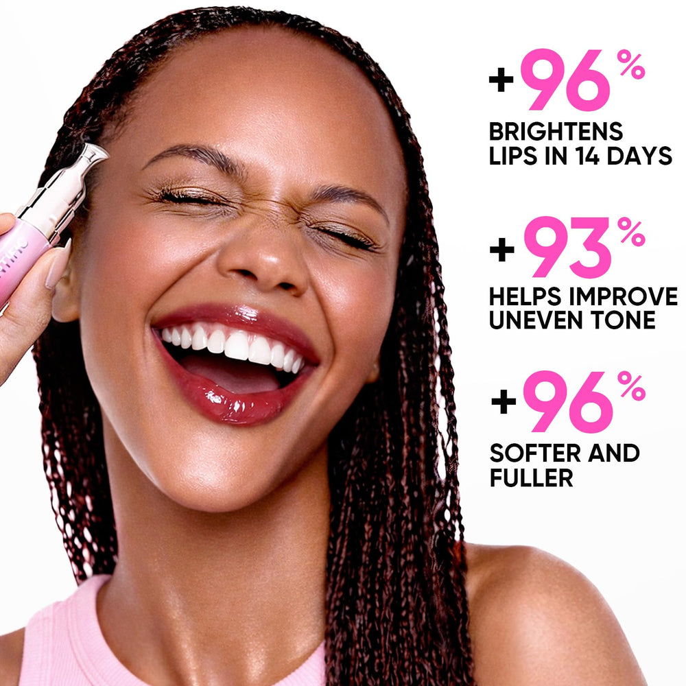SKINTIFIC layered over lipstick in lifestyle shot enhancing shine and comfort