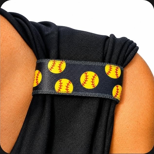 Sleeve Scrunchies beside a softball for scale showing compact, game-ready accessory