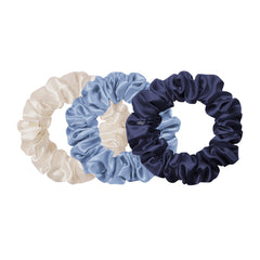 SLIP scrunchie on bedside pillowcase showing coordinated hair-care and sleep benefit