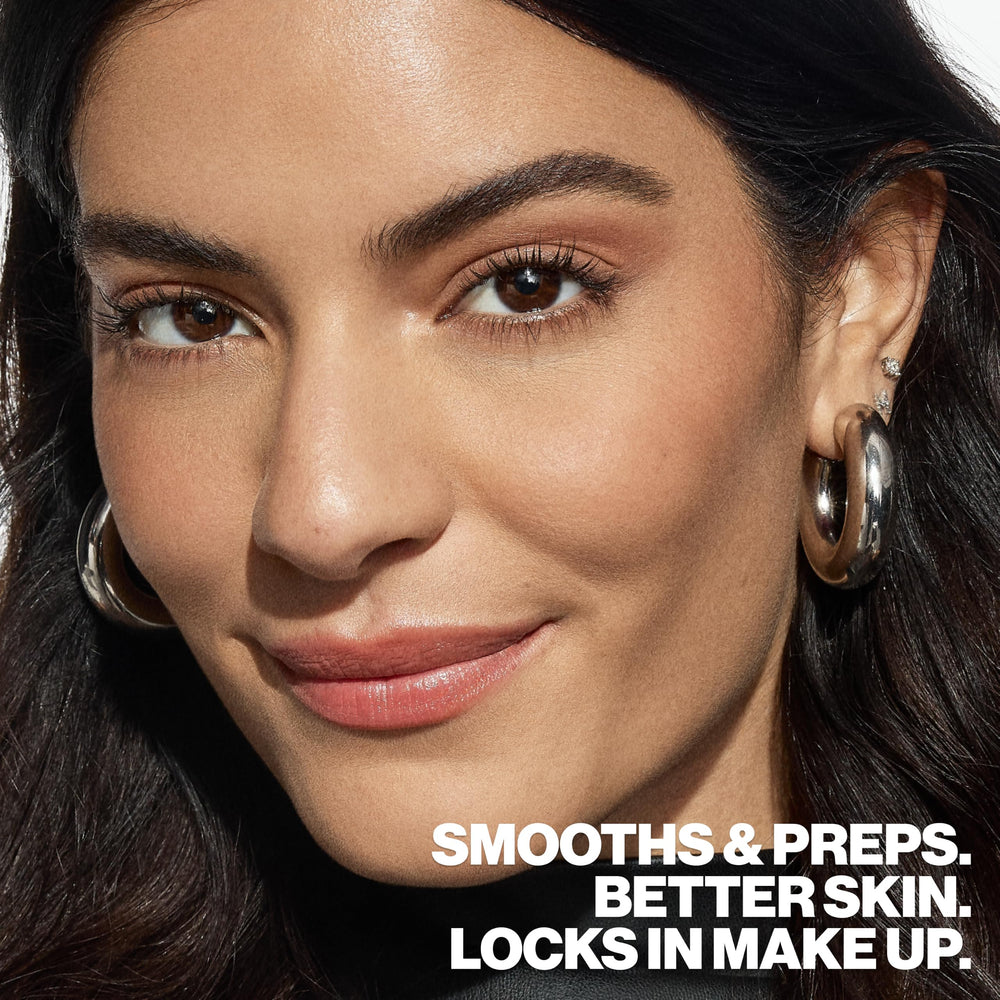 Smashbox primer held in hand to show size and easy portability benefit
