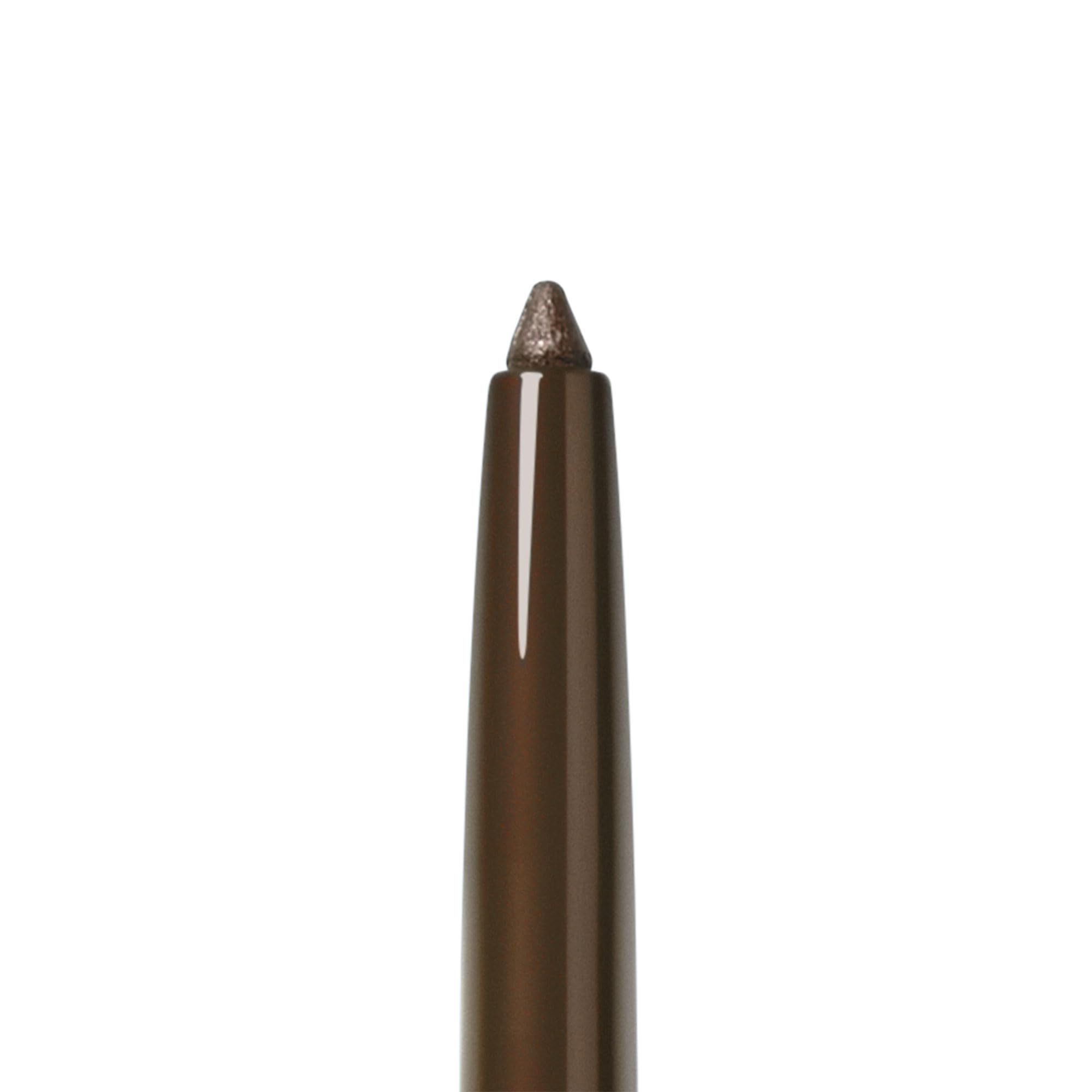 Smashbox pencil next to coin showing compact travel-friendly size