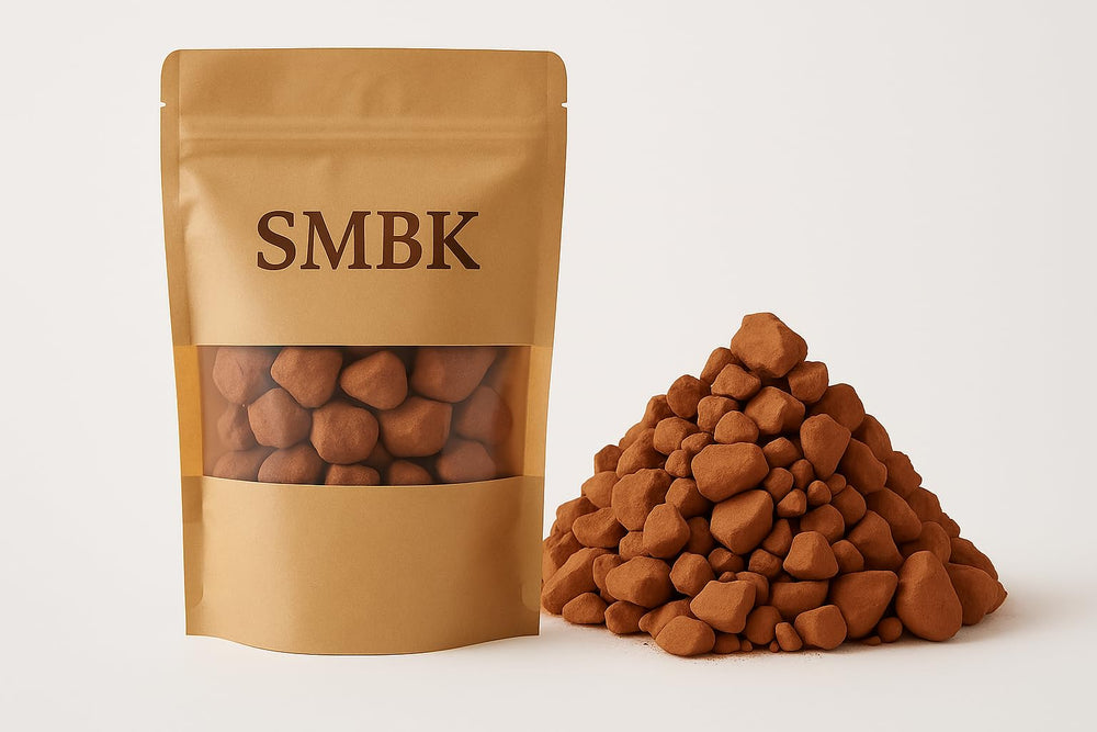 SMBK red clay beside a measuring spoon showing 3 oz scale