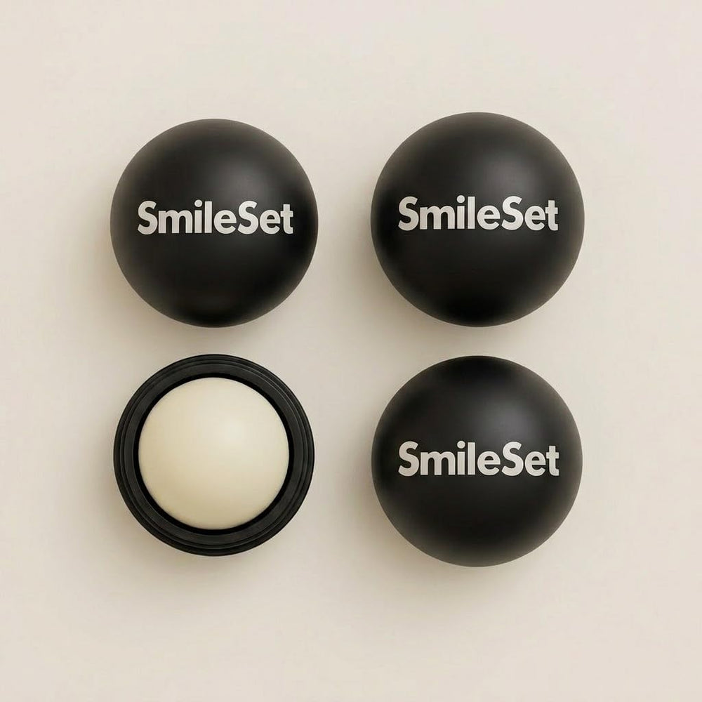 SmileSet sphere in hand applying balm to lips demonstrating easy glide and convenient reapplication benefit