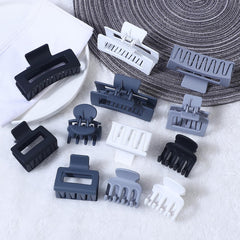 SMKSL hand holding three sizes showing scale and versatile styling benefit