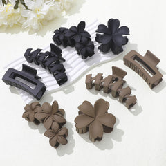 SMKSL clip in hand for scale showing compact travel-friendly size and convenience