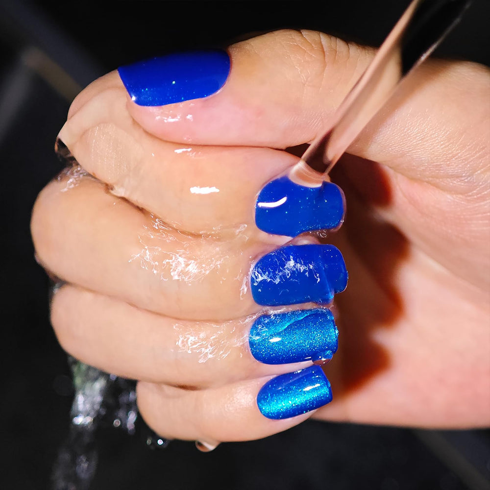 SnypeeLab nails worn on hands at a barbecue showing festive styling benefit