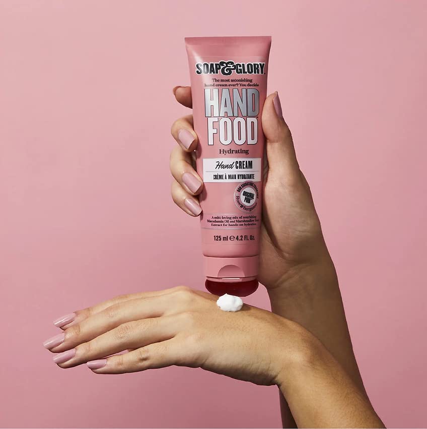 Soap & Glory hand applying cream demonstrating quick absorption benefit