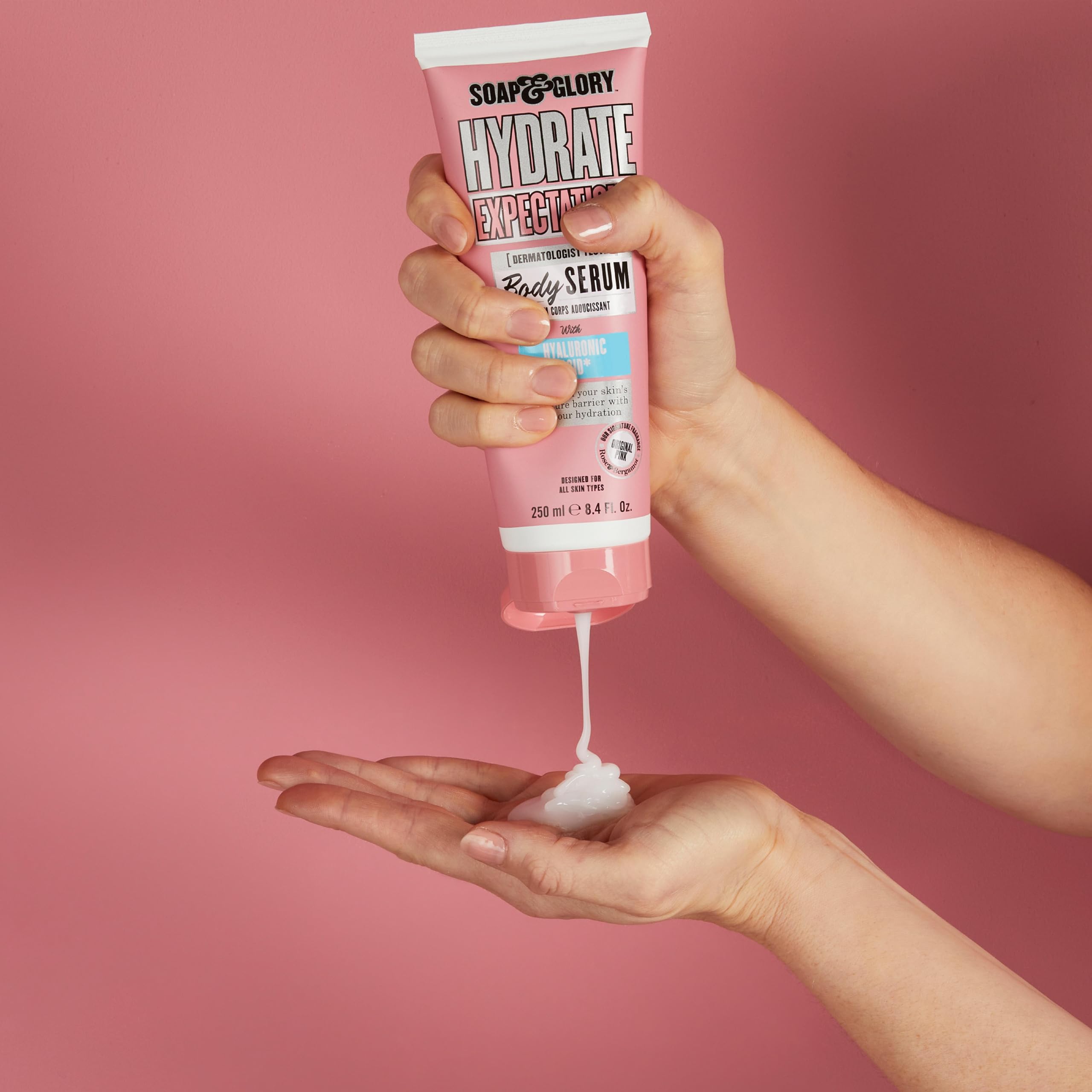 Soap & Glory 8.4 fl oz bottle beside common items for scale