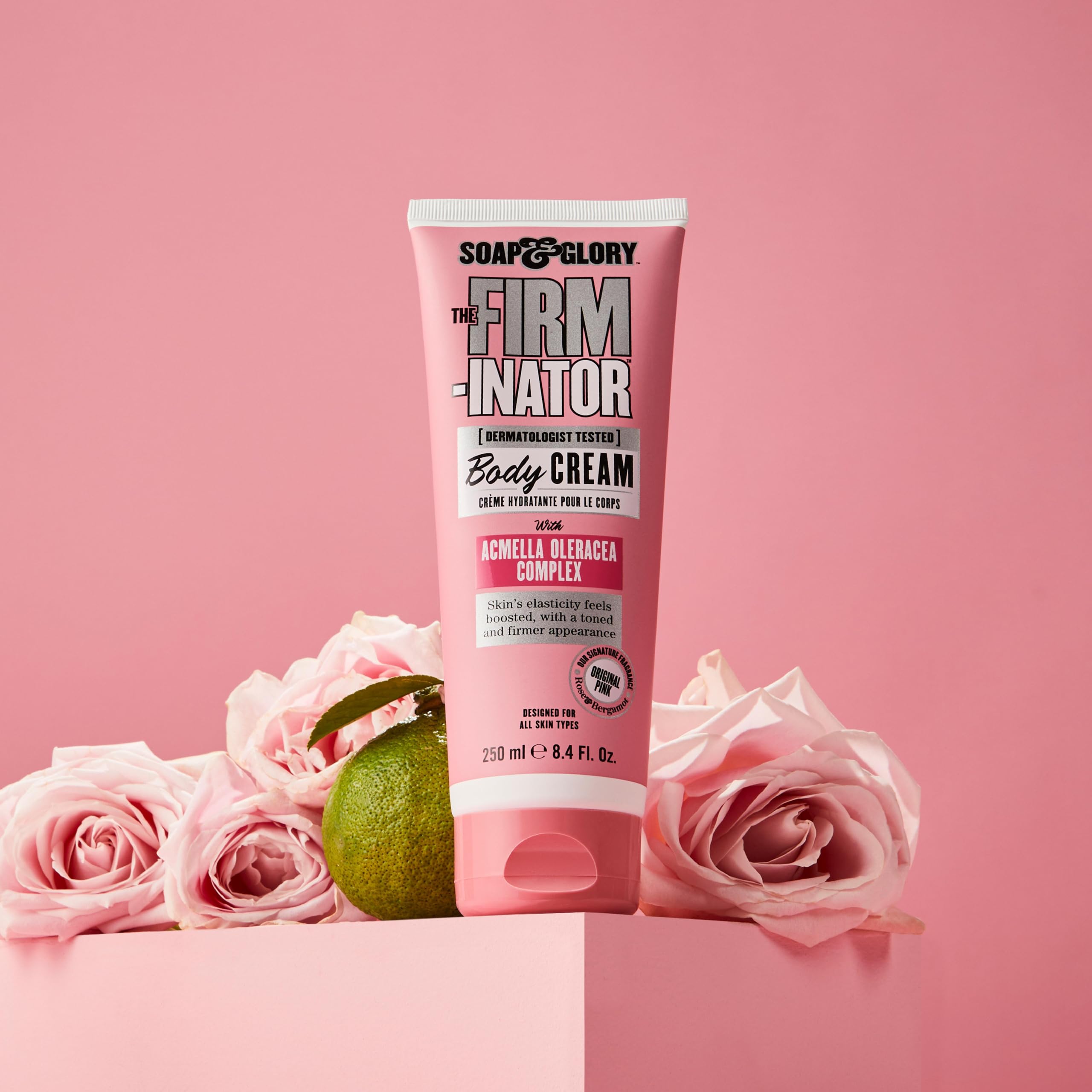 Soap & Glory size comparison next to hand to show portable 8.4 oz benefit