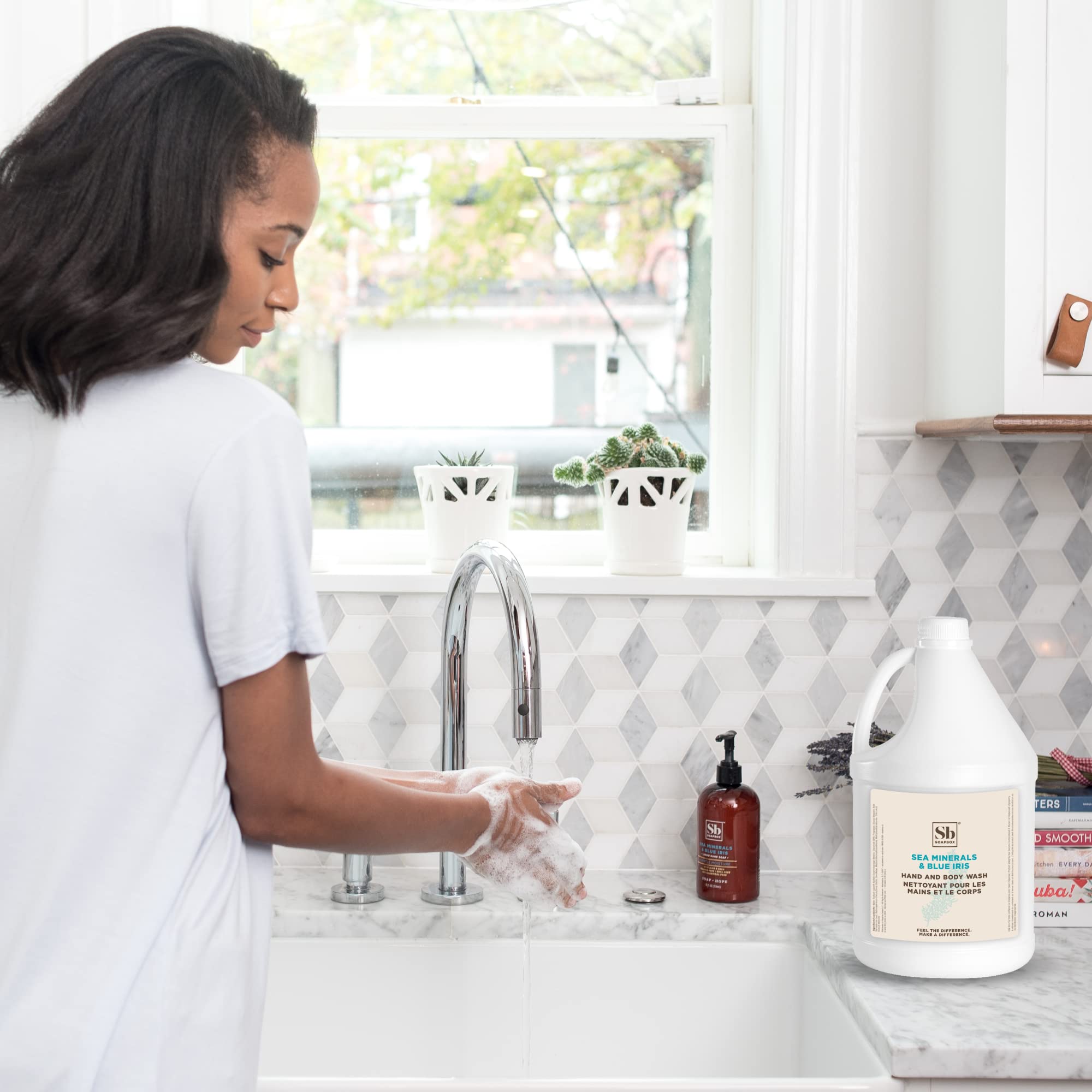 Soapbox gallon next to 16oz bottle highlighting refill value