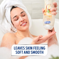 Softsoap 20 ounce bottle held in hand for size comparison