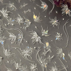 SOFTSOUL tweezers and scissors beside sticker sheet for precise placement benefit