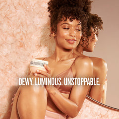 Sol de Janeiro mist spraying into air to refresh hair and body scent