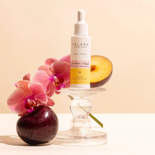 Solara Suncare label closeup highlighting zinc oxide and peptide ingredients benefits