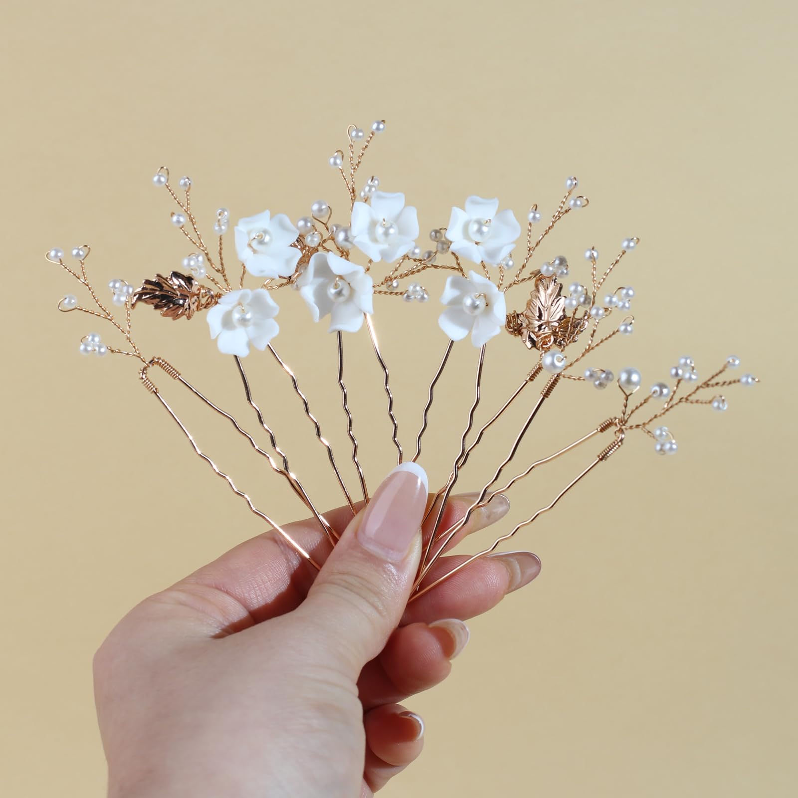 SOLENY close-up of white ceramic flower showing handcrafted detail and refined texture