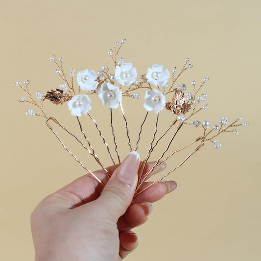 SOLENY close-up of white ceramic flower showing handcrafted detail and refined texture