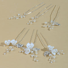 SOLENY pins artfully arranged on white fabric showing coordinated styling options advantage