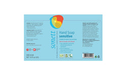 Foamy texture of Sonett soap on hand showing mild lather and softness