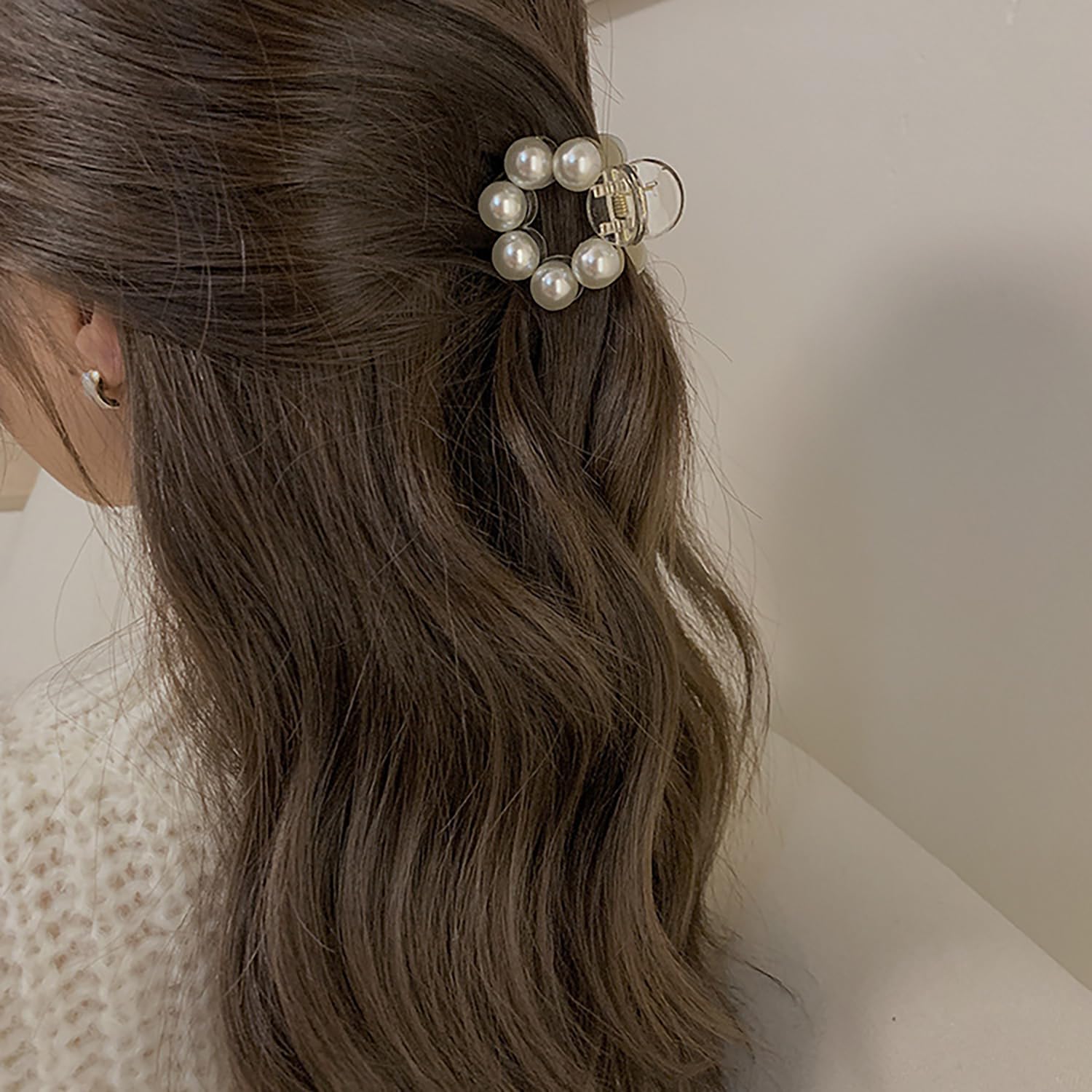 SONGJIE clip used in half-up hairstyle demonstrating polished finish benefit