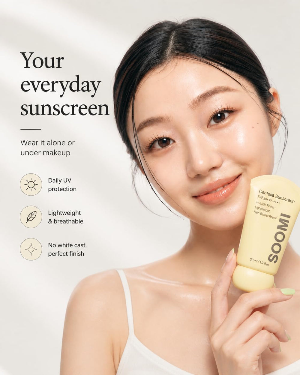Soomi Skin Centella sunscreen held in hand for size comparison and easy everyday carry