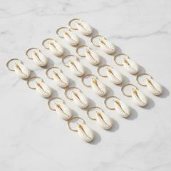 Sopopal hair clips styled with beach outfit illustrating seasonal versatility