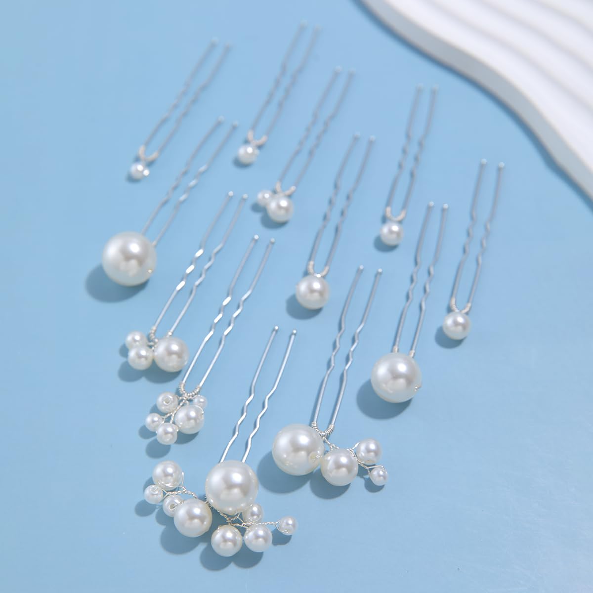 soulshow pins placed in bridal updo, illustrates elegant effect for wedding hairstyles