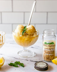 Spice Islands lemon peel in white bowl ready for cooking, adds bright flavor