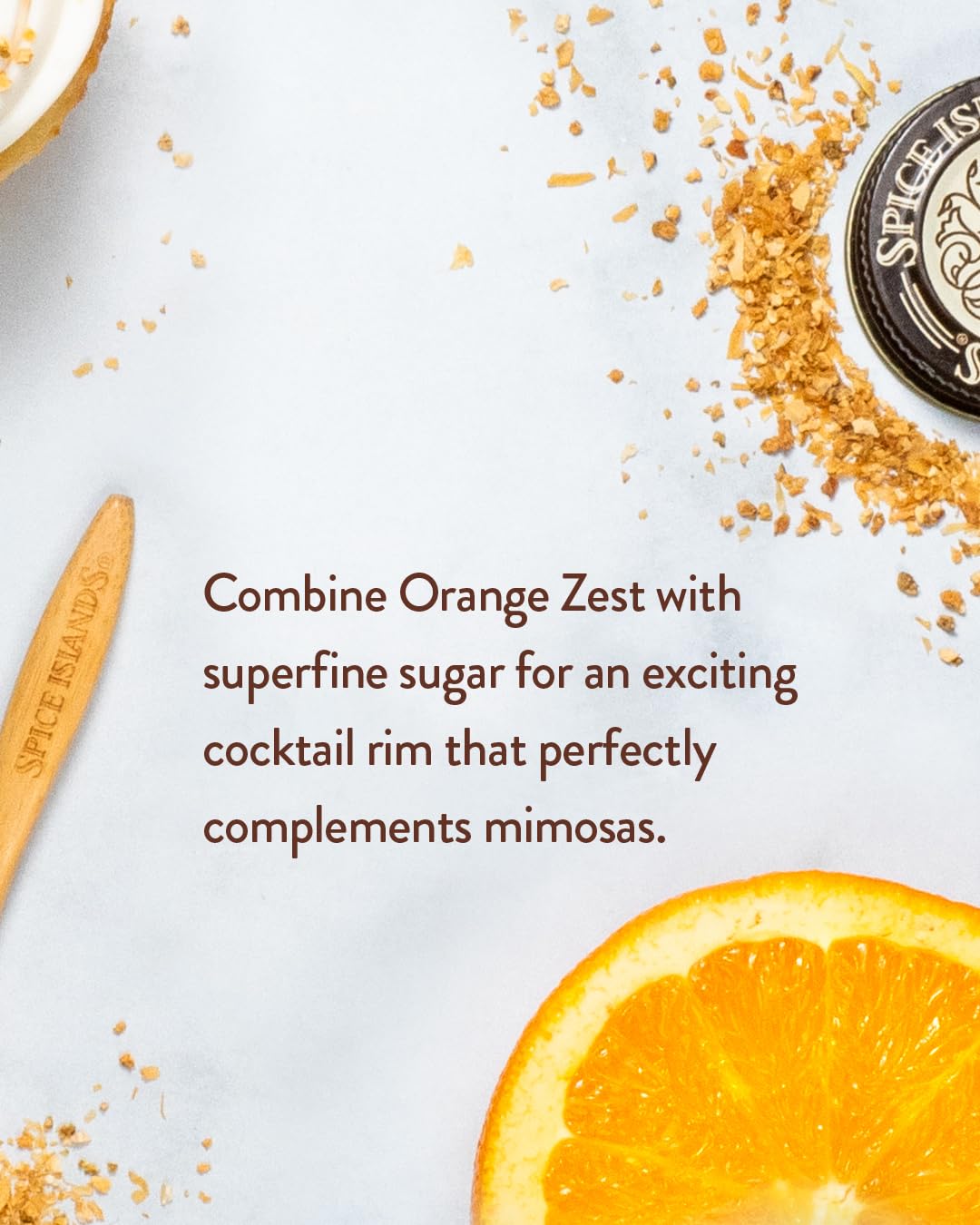 Spice Islands orange peel garnish on cocktail adding bright citrus aroma