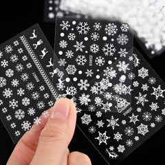 SPLOCUDU tweezers placing a decal on a nail showing precise application benefit