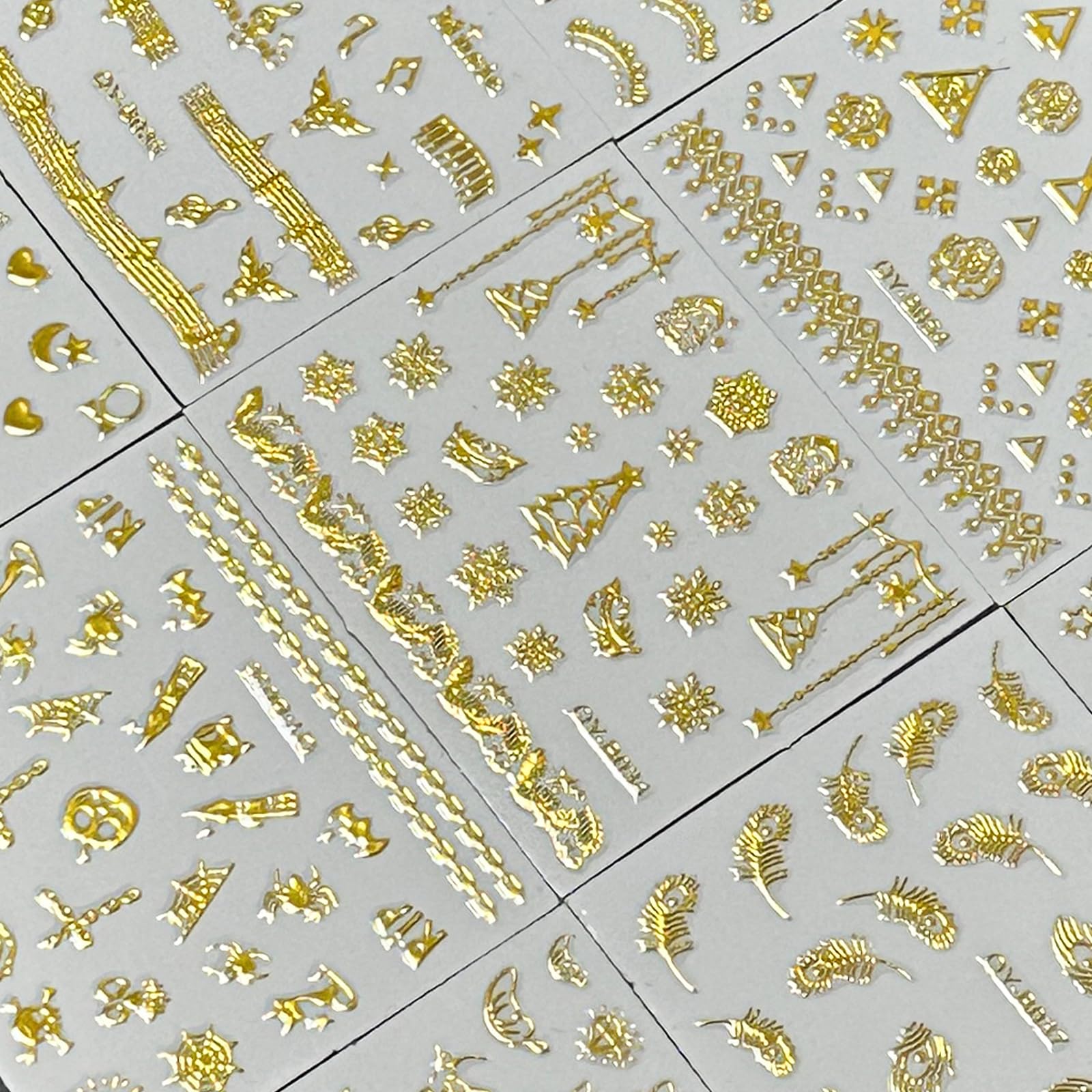 SPLOCUDU overhead view of multiple sheets displaying varied gold motifs