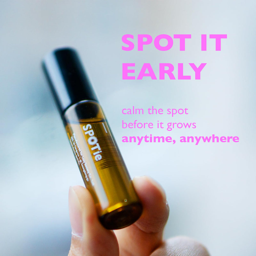 SPOTie beside lipstick for scale showing small pocket-friendly size