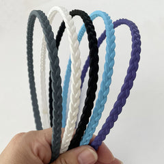 Springtime headband bent to show flexibility and durable rubberized finish