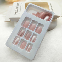 SRIMNUYY side profile showing short square full-cover nails for natural look