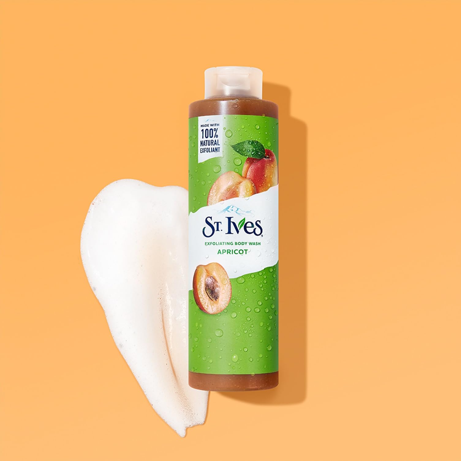 St. Ives pump dispensing creamy apricot foam demonstrating easy application and quick lather