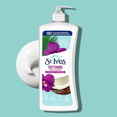 Person applying St. Ives lotion to hands illustrating quick absorption